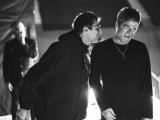 Liam y Noel Gallagher sonriendo